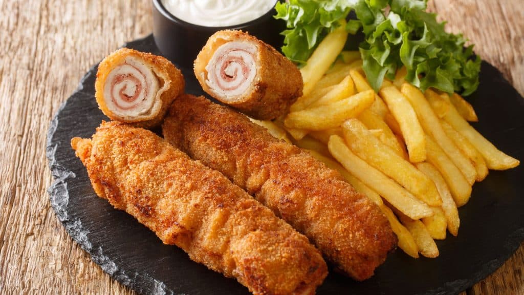 What to Eat in Andalusia: A Guide to the Region's Best Cuisine Flamenquín pork roll is breaded and fried until crispy