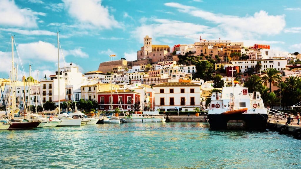Ibiza is known for its vibrant nightlife, stunning beaches, and relaxed atmosphere
