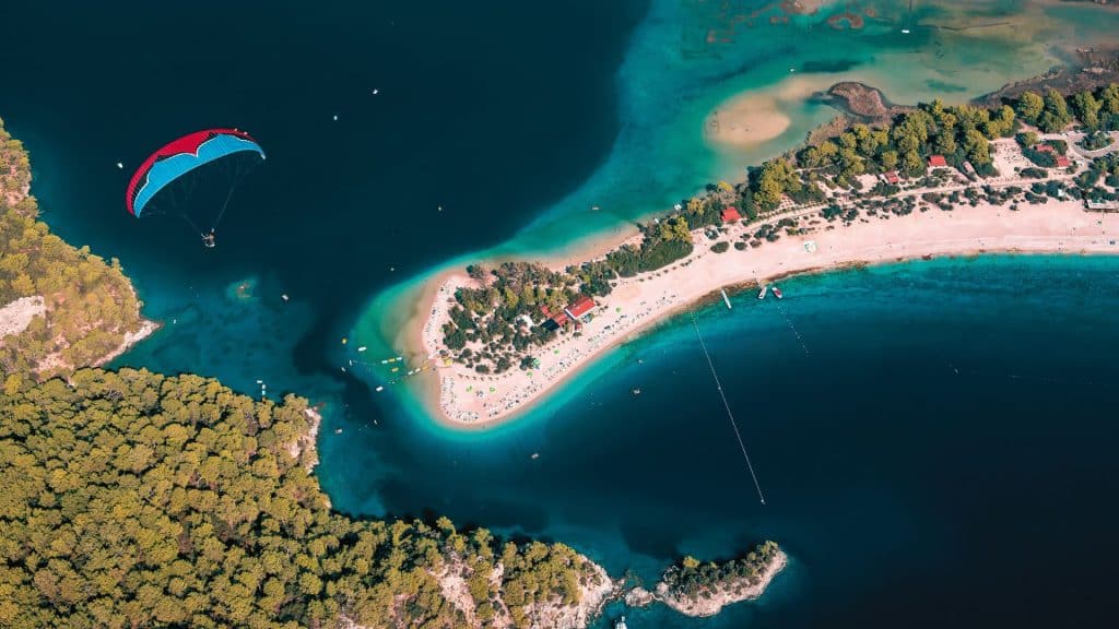 Ölüdeniz Beach is a paradisiacal destination known for its mesmerizing waters, scenic beauty, and peaceful ambiance, making it a must-visit location for beach lovers and nature enthusiasts