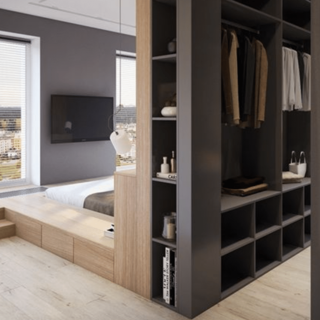 Clever storage as a bedroom space divider