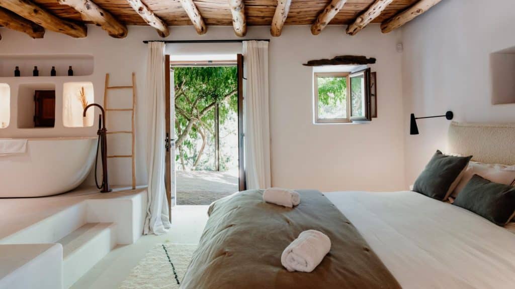 The wooden furniture enhances the room's cohesion and blend traditional craftsmanship with clean, contemporary lines
